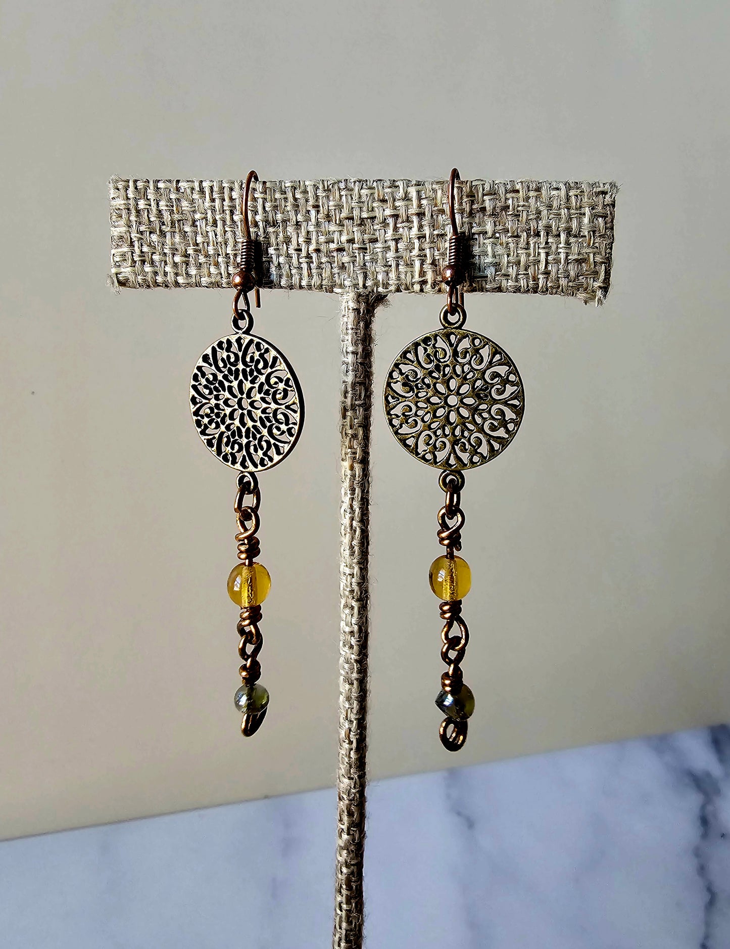 Artisan Antique Bronze Mandala Charm Earrings with Green & Yellow Glass Beads